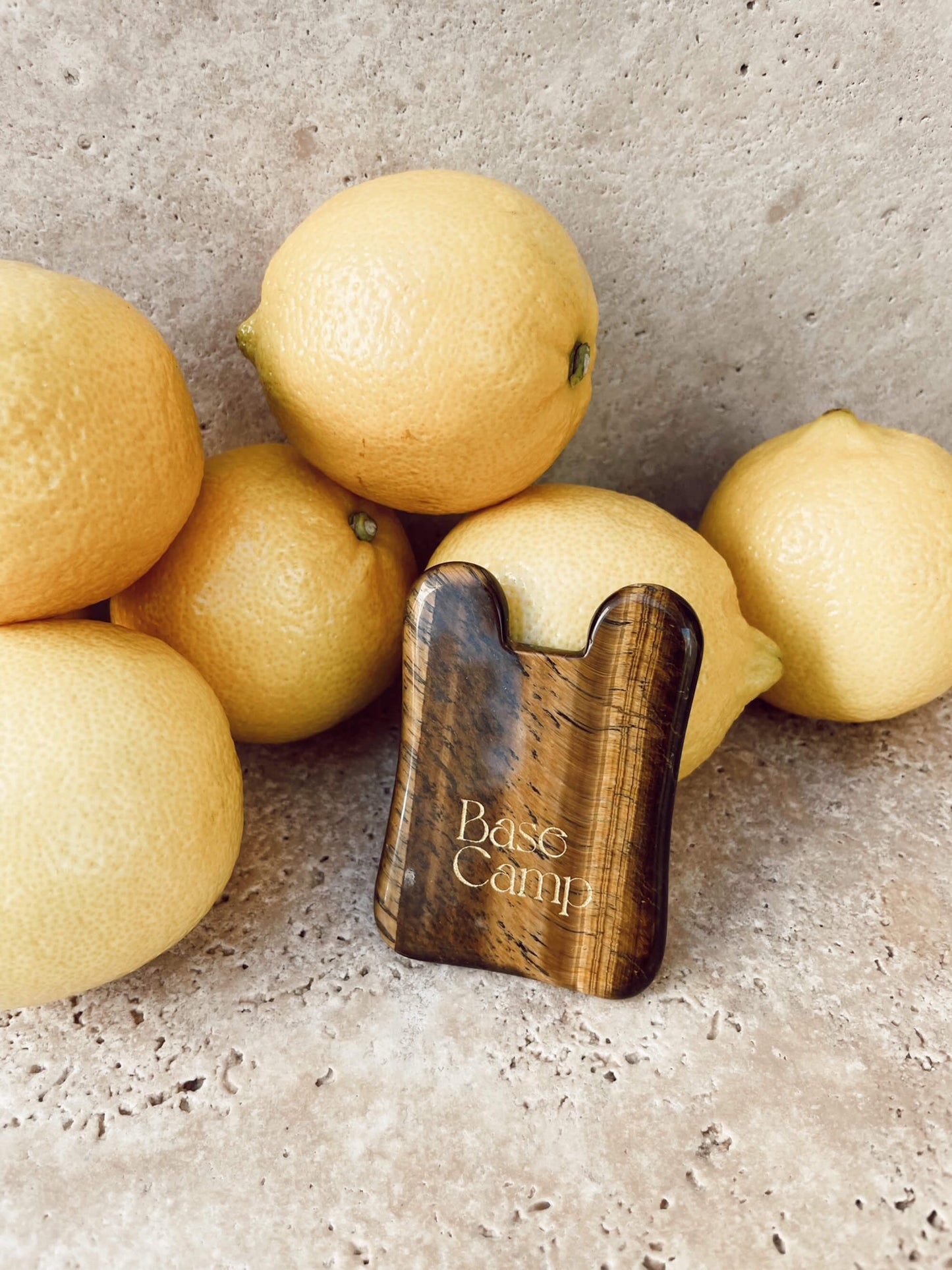 Base Camp Beauty Gua Sha facial tool for a self-care ritual.