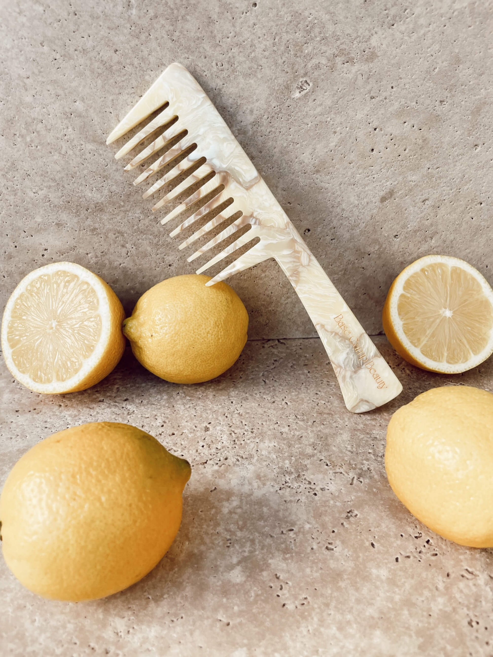 Base Camp Beauty Comb in colour buttermilk styled with lemons.