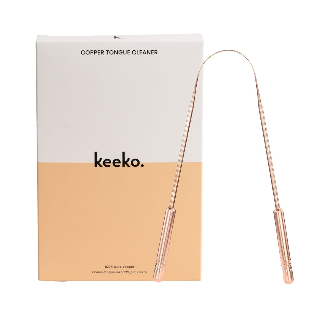 Keeko Copper Tongue Cleaner and white and apricot colouredbox.